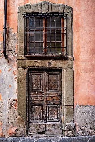 Craggy old entrance in Lucca, Italy Art Print